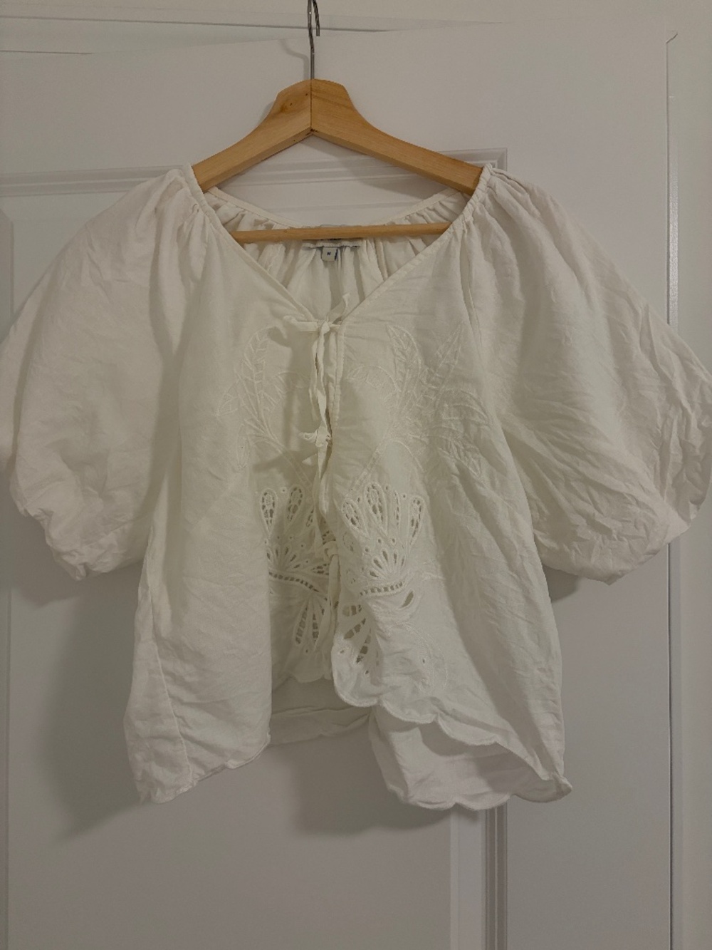 Women’s white peasant top